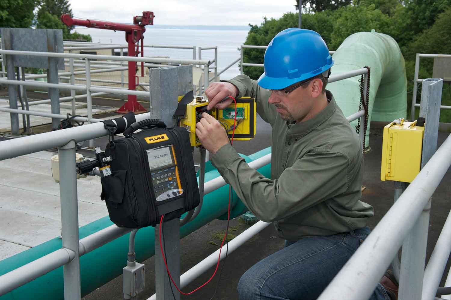 The Fluke 754 Documenting Process Calibrator Used by a Technician at a Plant